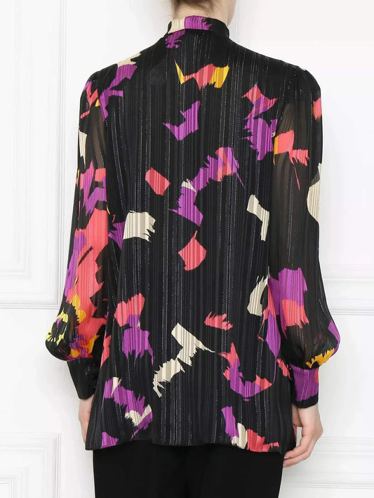 Elegant georgette blouse banner with metallic thread, V-neck, bow detail, and gathered sleeves with buttoned cuffs.