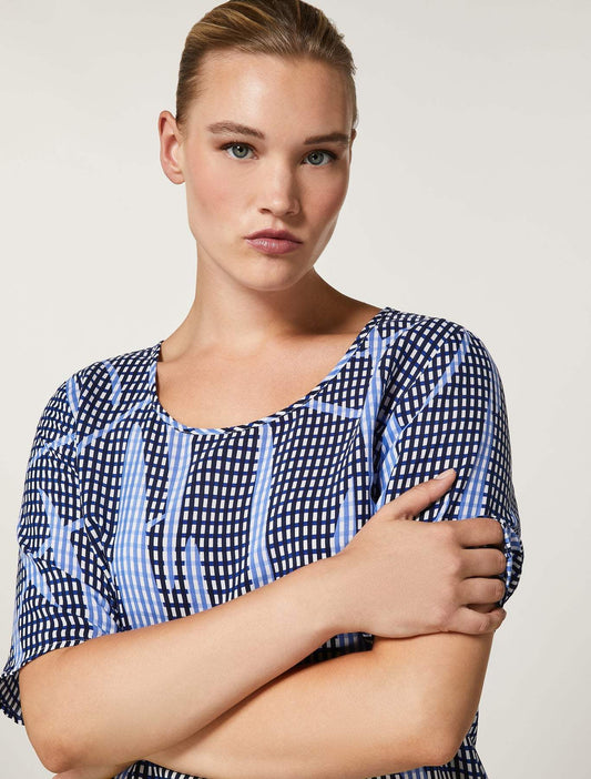 Top CORINTO in cupro and viscose with round neckline, short sleeves, and side slit detail