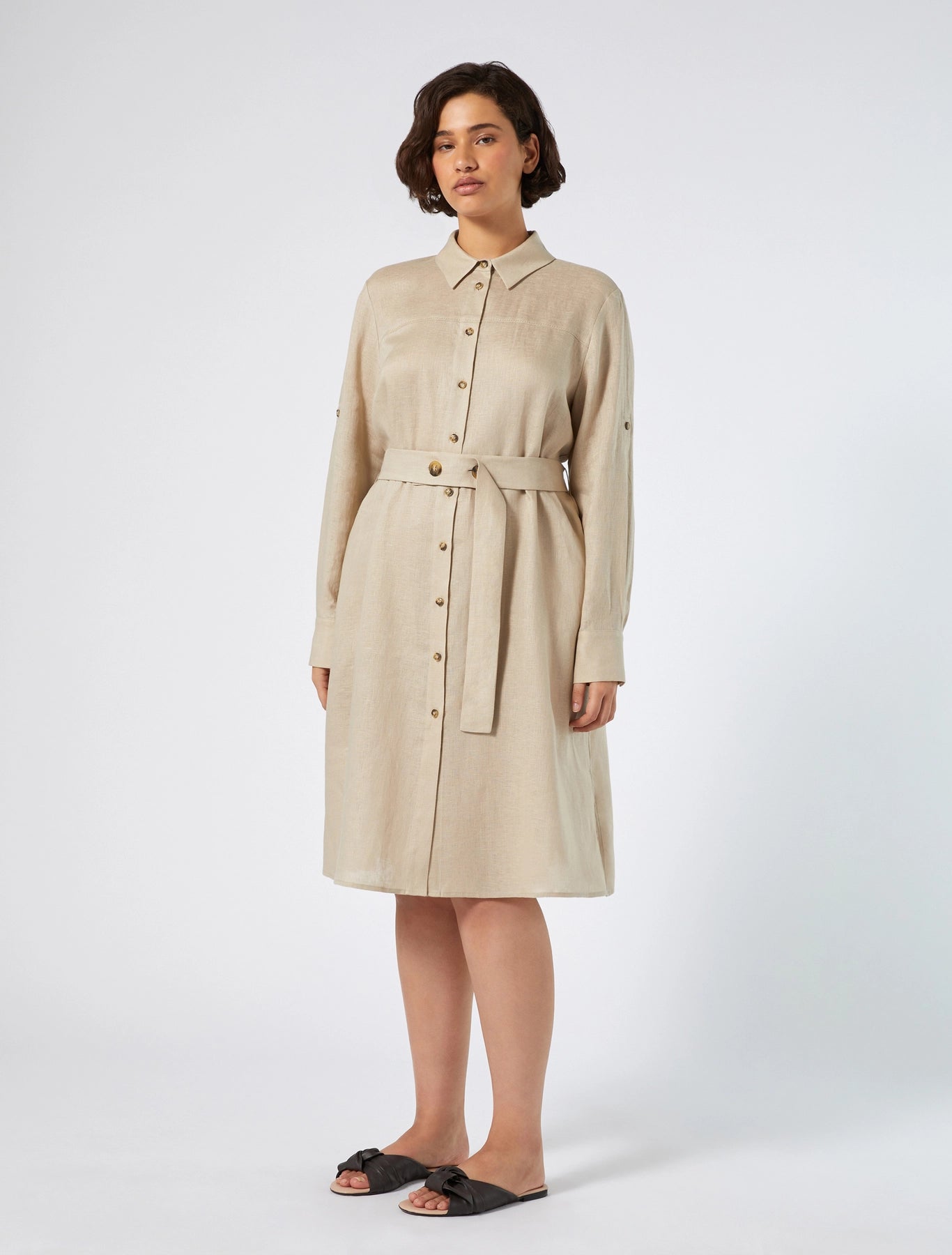 linen shirt dress in beige with long sleeves and belt — front view