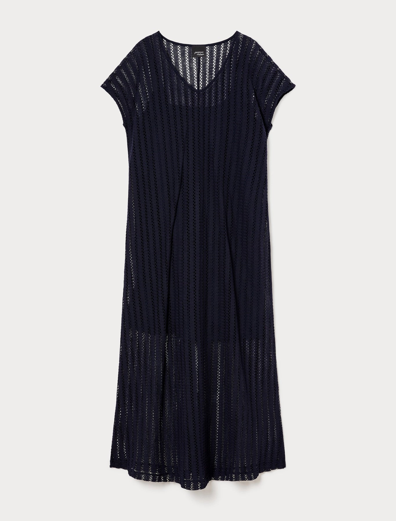 GIOCHI crochet dress laid out with soft drape