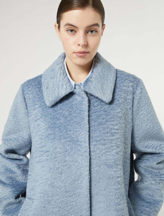 Eco fur coat with straight cut, snap buttons, shirt collar, and long sleeves in lightweight textured jersey fabric