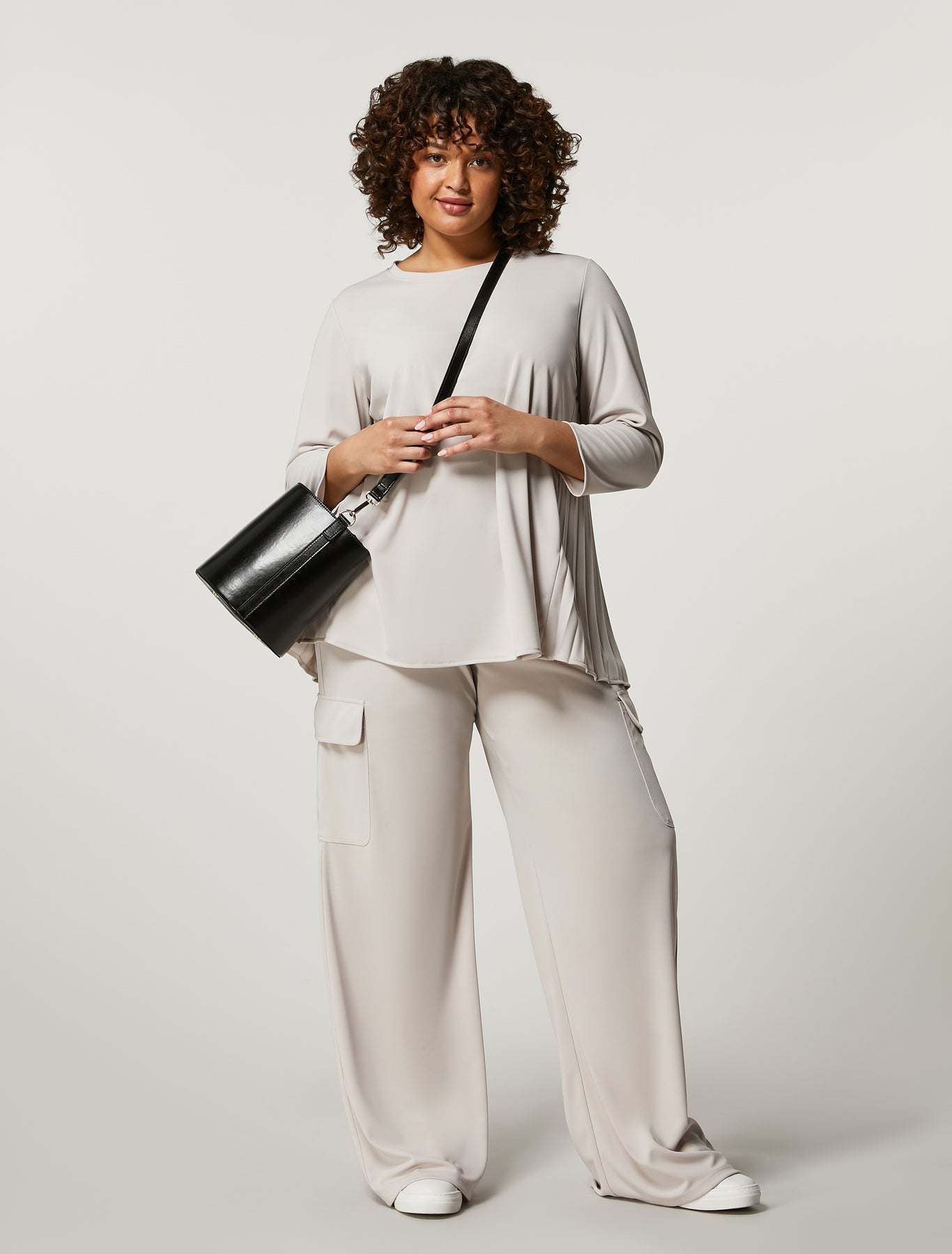 Ivory ARMONIA tunic with pleated chiffon back panel and 3/4 sleeves for elegant women