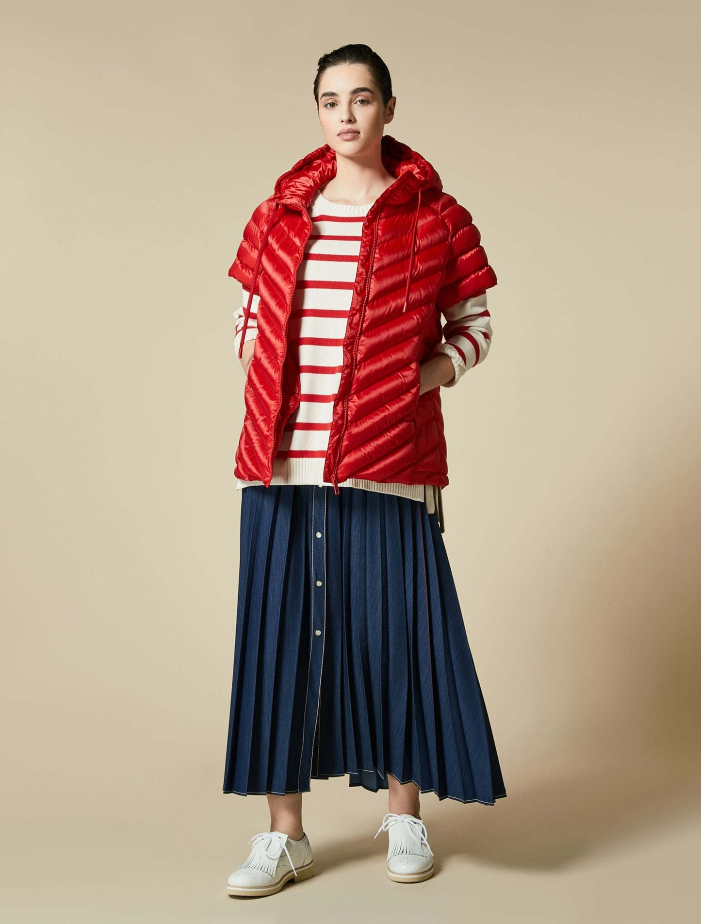 Quilted vest PALMA with drawstring hood and zip fastening made of 100% polyester with vegan padding