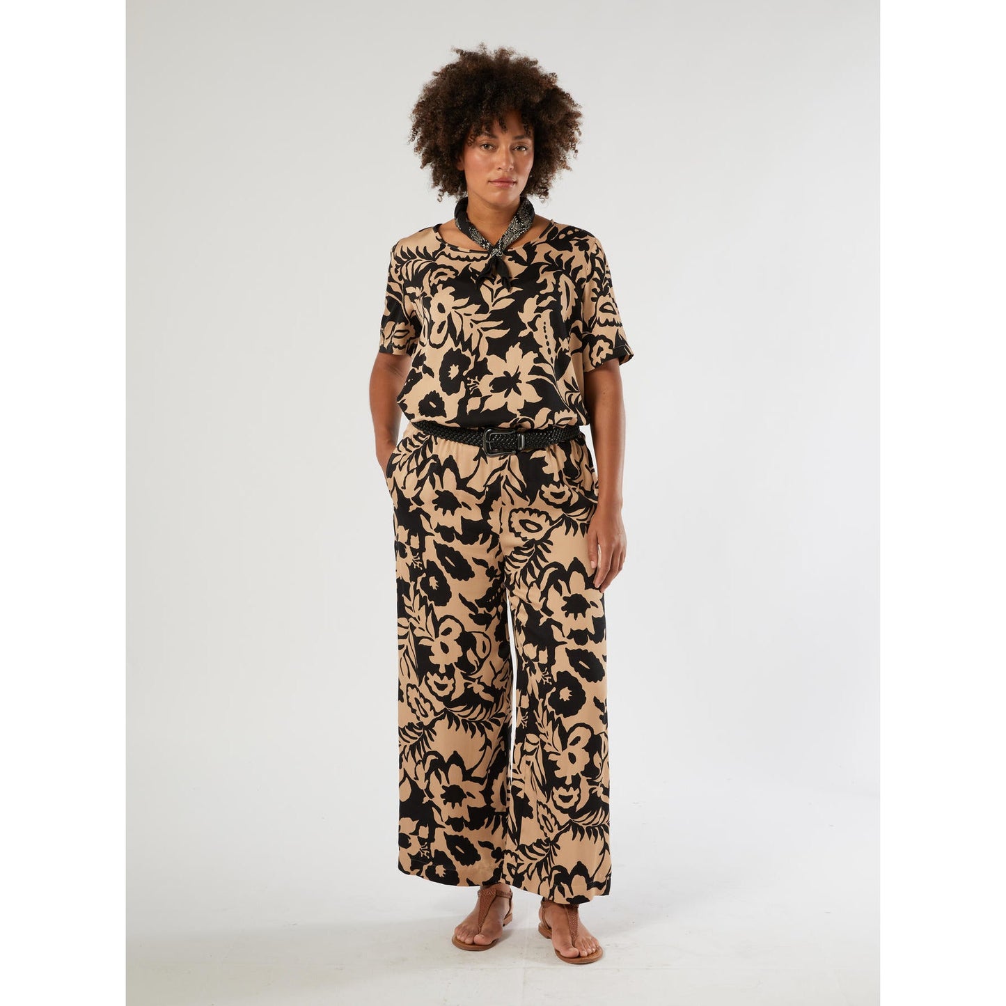 BIKINI printed viscose satin trousers with bold print and fluid cropped silhouette