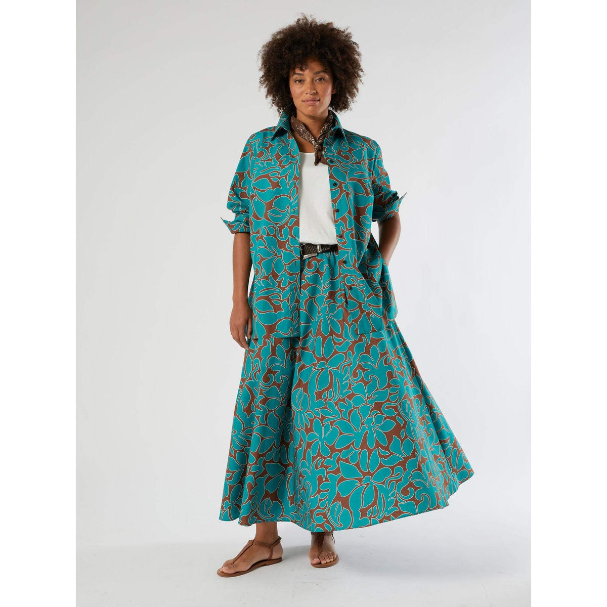 Flowing printed cotton skirt with elastic waistband and artistic design perfect for summer.