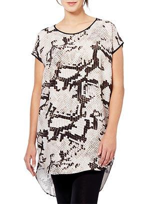 Favella animal-print tunic by Persona featuring lightweight fabric, round neckline, dolman sleeves, and a longer back hem.