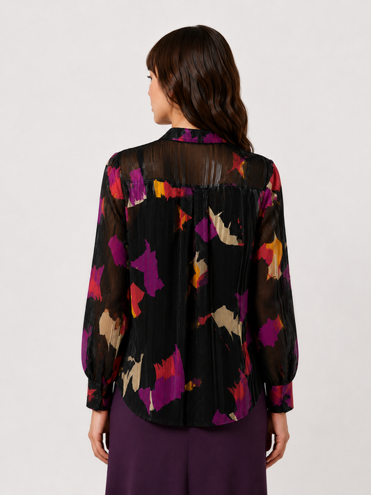 Elegant georgette blouse with metallic thread, V-neck, bow detail, and gathered sleeves with button cuffs, perfect for festive and business events.