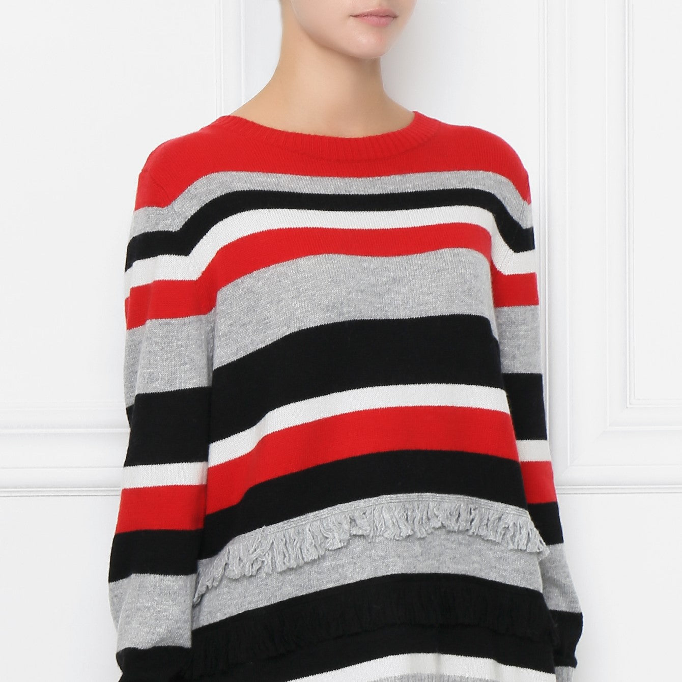 Brightly striped sweater. Folded hem. Long sleeves