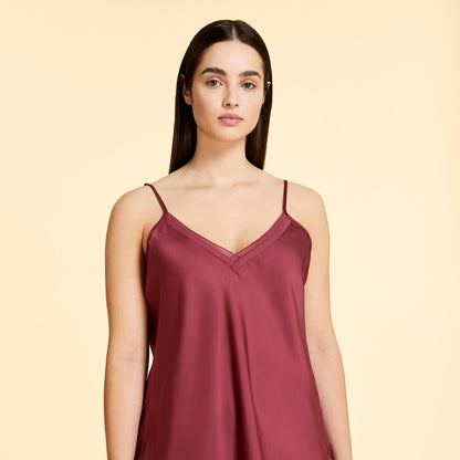 Satin top with loose fit, collar adorned with small pleats and thin adjustable straps