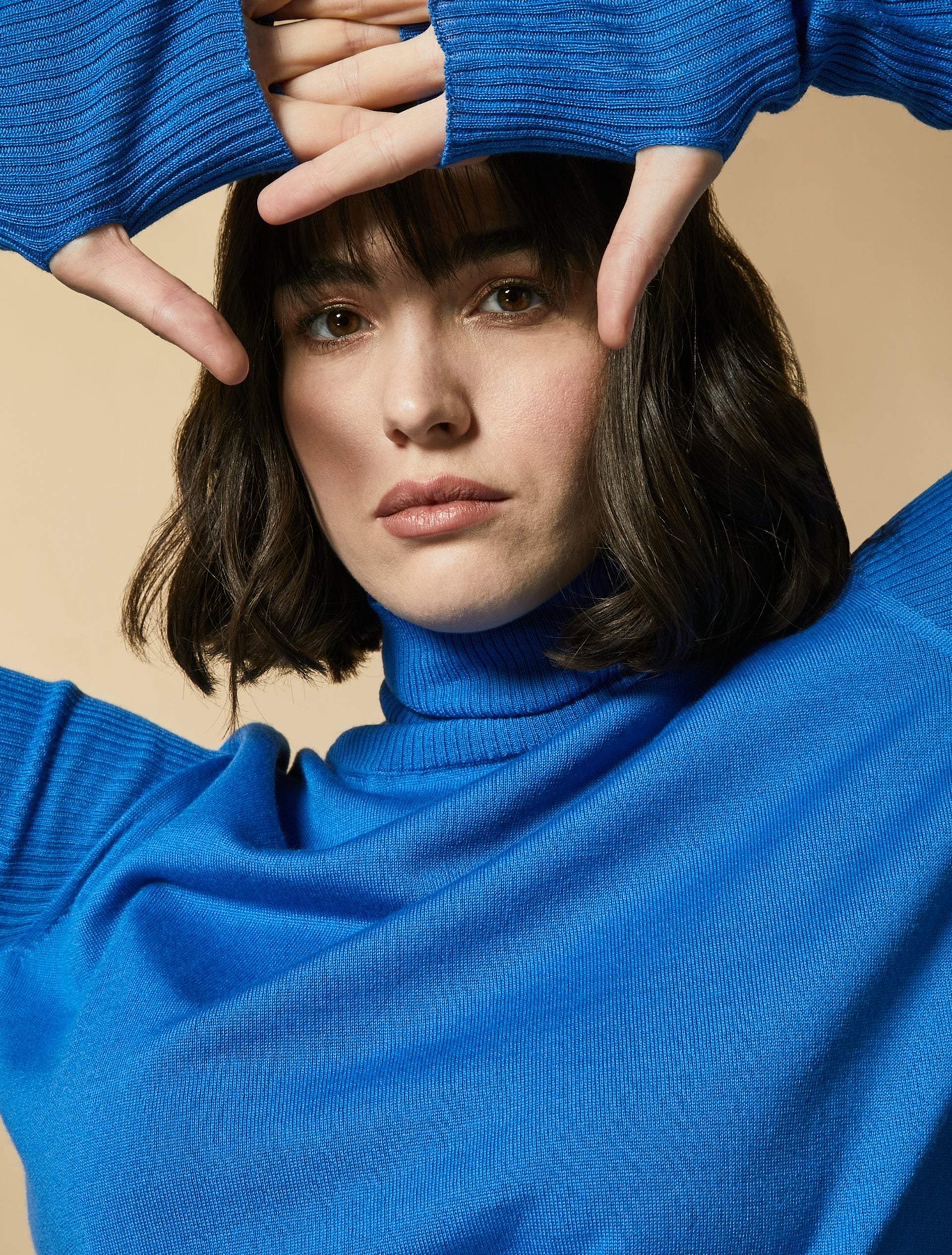ASSOLUTO high-neck sweater in bright blue merino wool blend with thumbhole cuffs by Marina Rinaldi