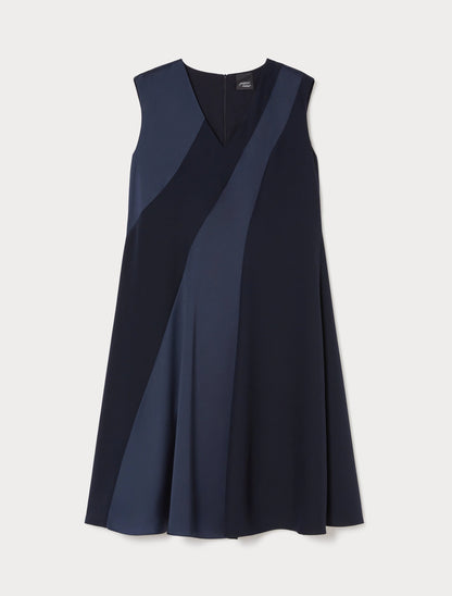 Flat view of CLORURO dress showing asymmetrical design of satin panels"