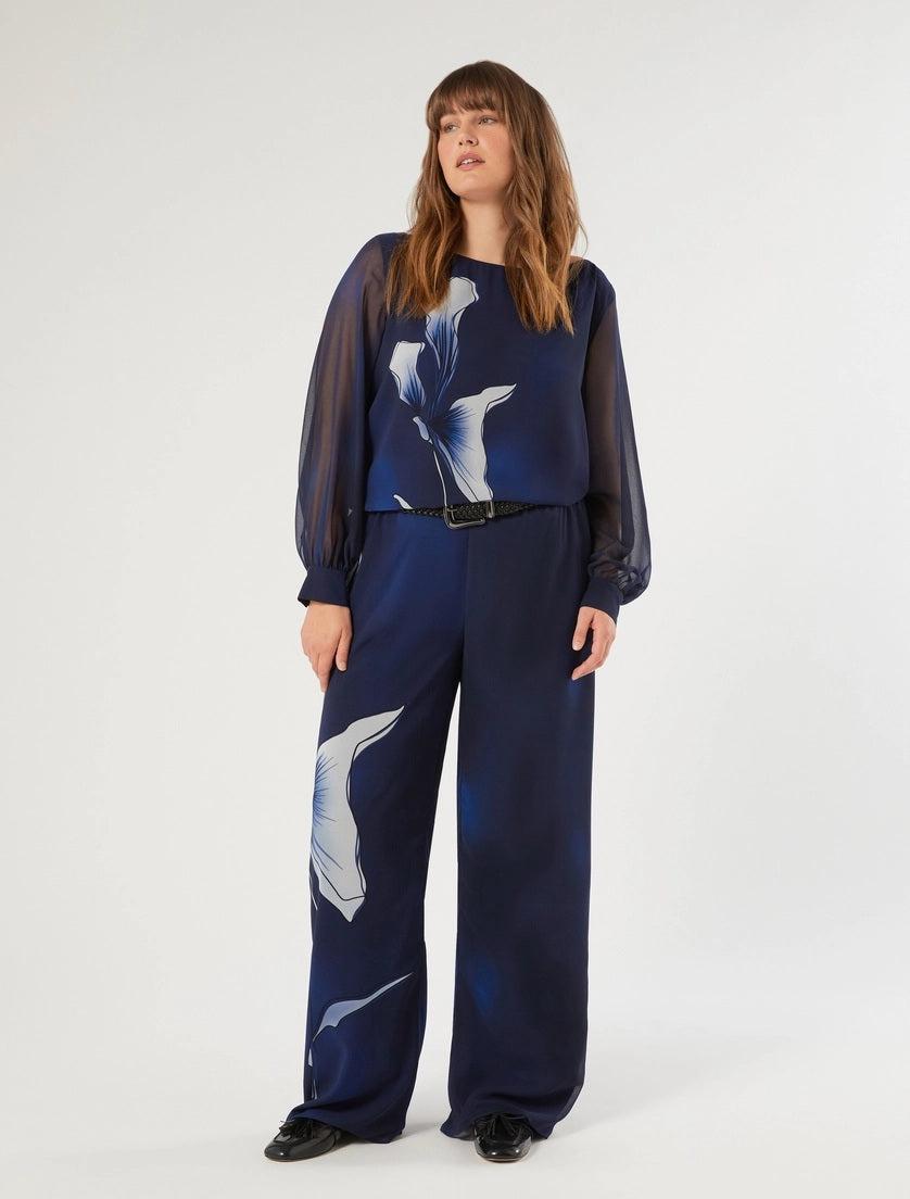 Woman wearing straight-cut georgette blouse with exclusive print and long gathered cuffs from Persona by Marina Rinaldi