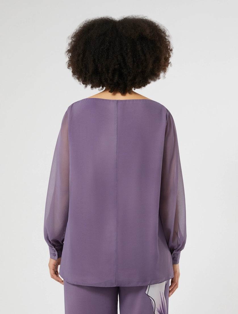Back view of straight-cut georgette blouse in purple with long sleeves and gathered cuffs