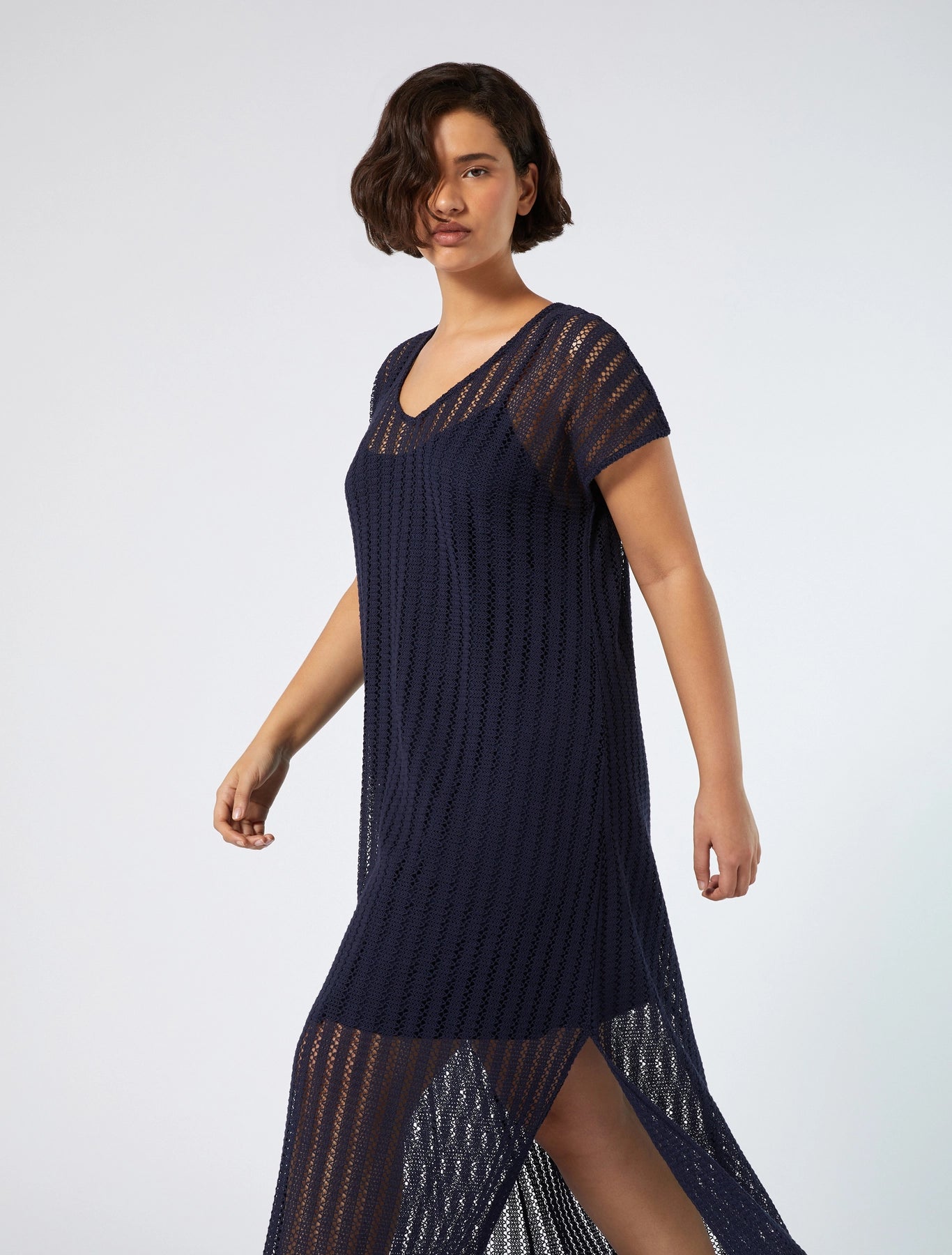 Dress in motion showing slit and texture