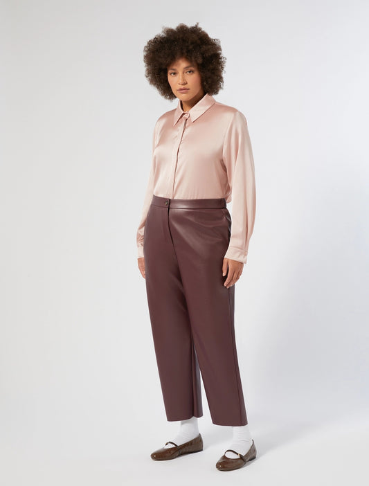 A OCCHIO burgundy faux leather trousers by Persona by Marina Rinaldi, front view on model