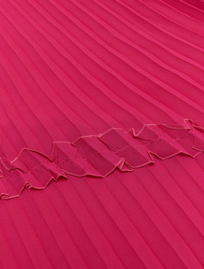 Close-up of pleated detail and stitched trims on pink stole”
