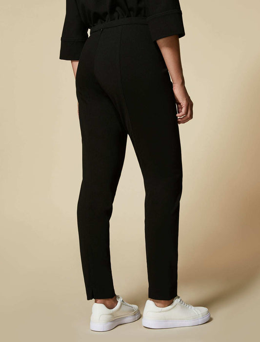 Trousers OCCHIATA-1 with elastic waist and split arrow design in black jersey fabric