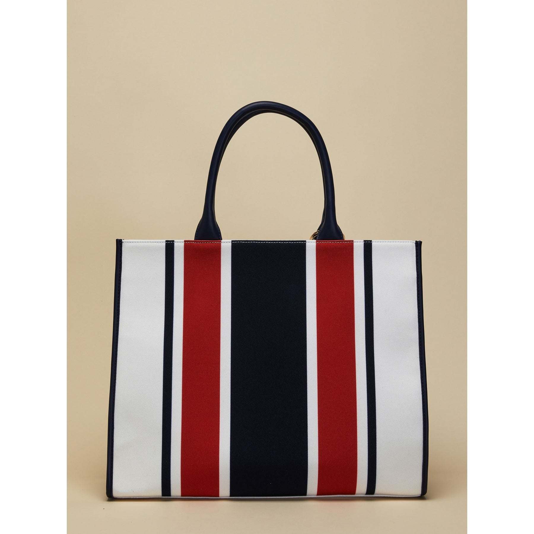 SANDY striped canvas tote bag in red, navy, and white with double handles and tassel pendant