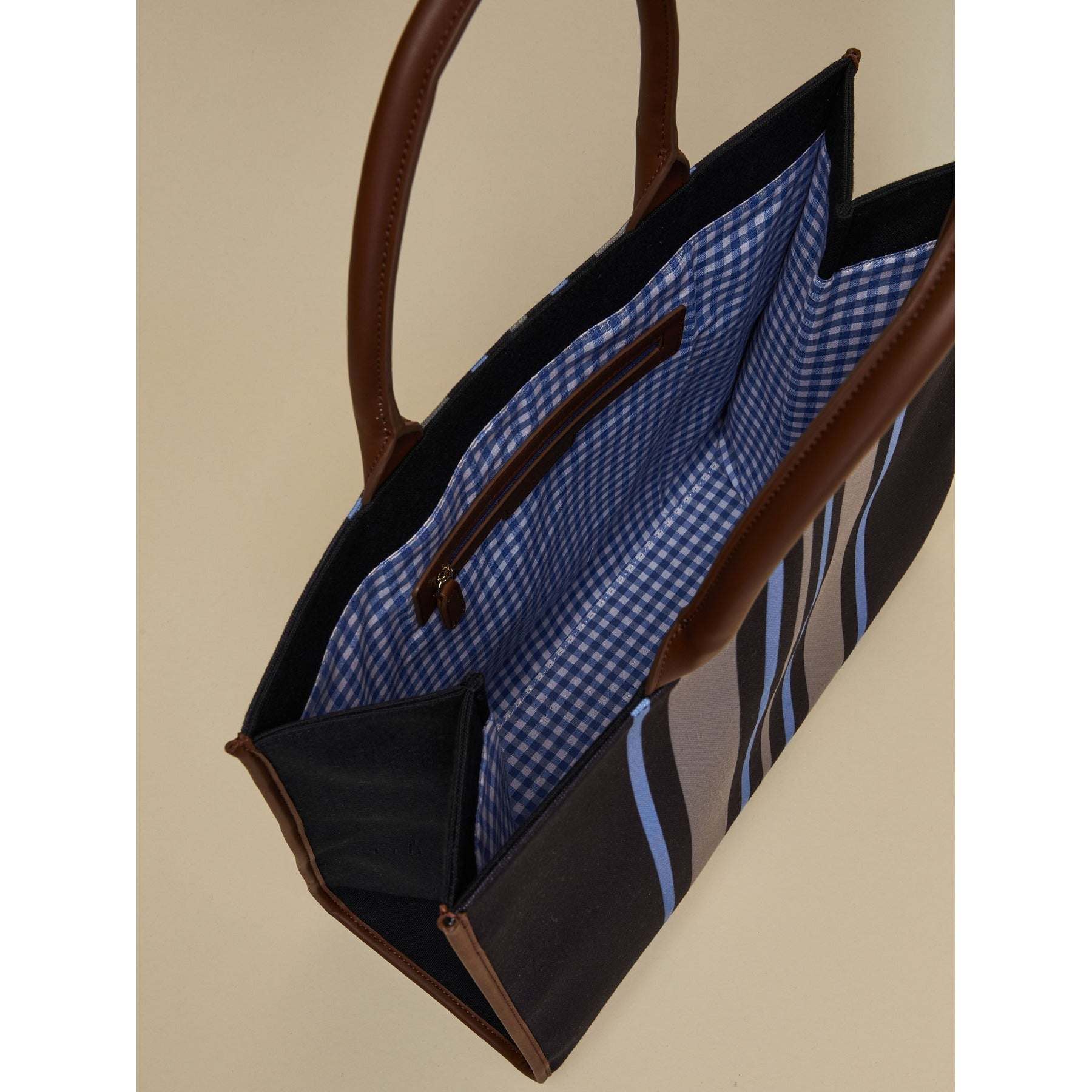 SANDY striped canvas tote bag in red, navy, and white with double handles and tassel pendant