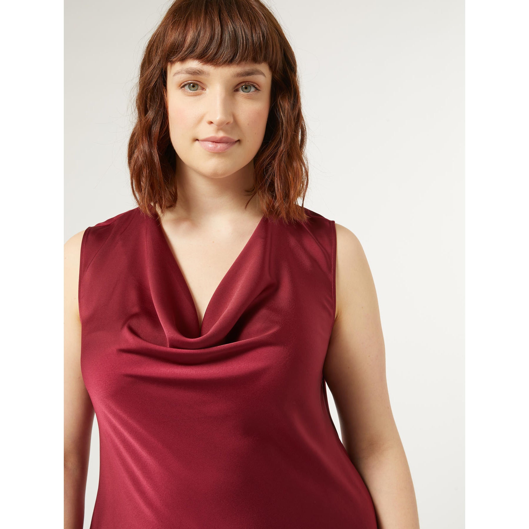 With the bias-cut satin material, ring collar, and removable sleeves, this dress from Persona by Marina Rinaldi truly steals the show. The mermaid line adds a unique touch to this stunning piece, making it a must-have for any fashion-forward individual. Elevate your wardrobe with this show-stopping dress.