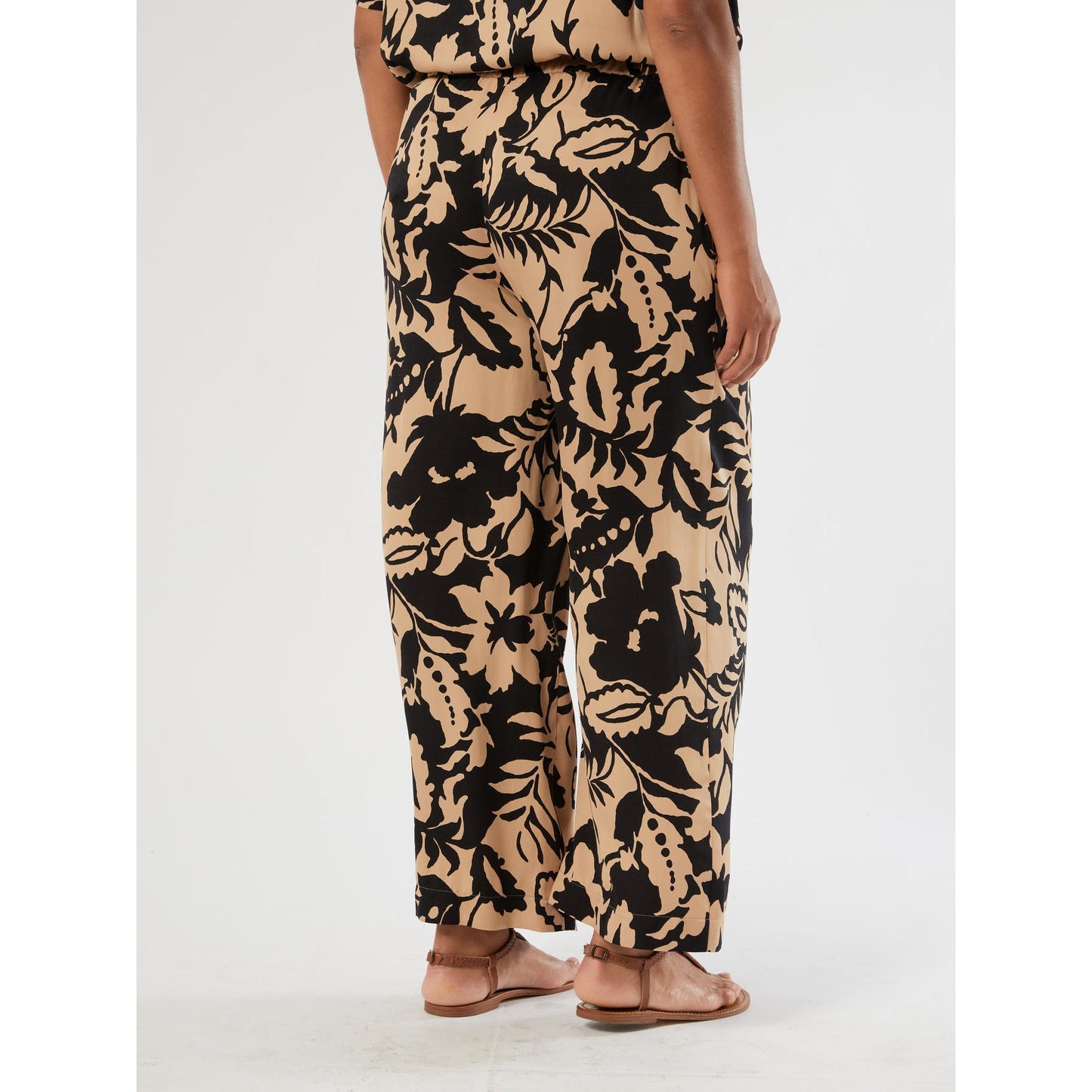 BIKINI printed viscose satin trousers with bold exclusive print and elastic waistband