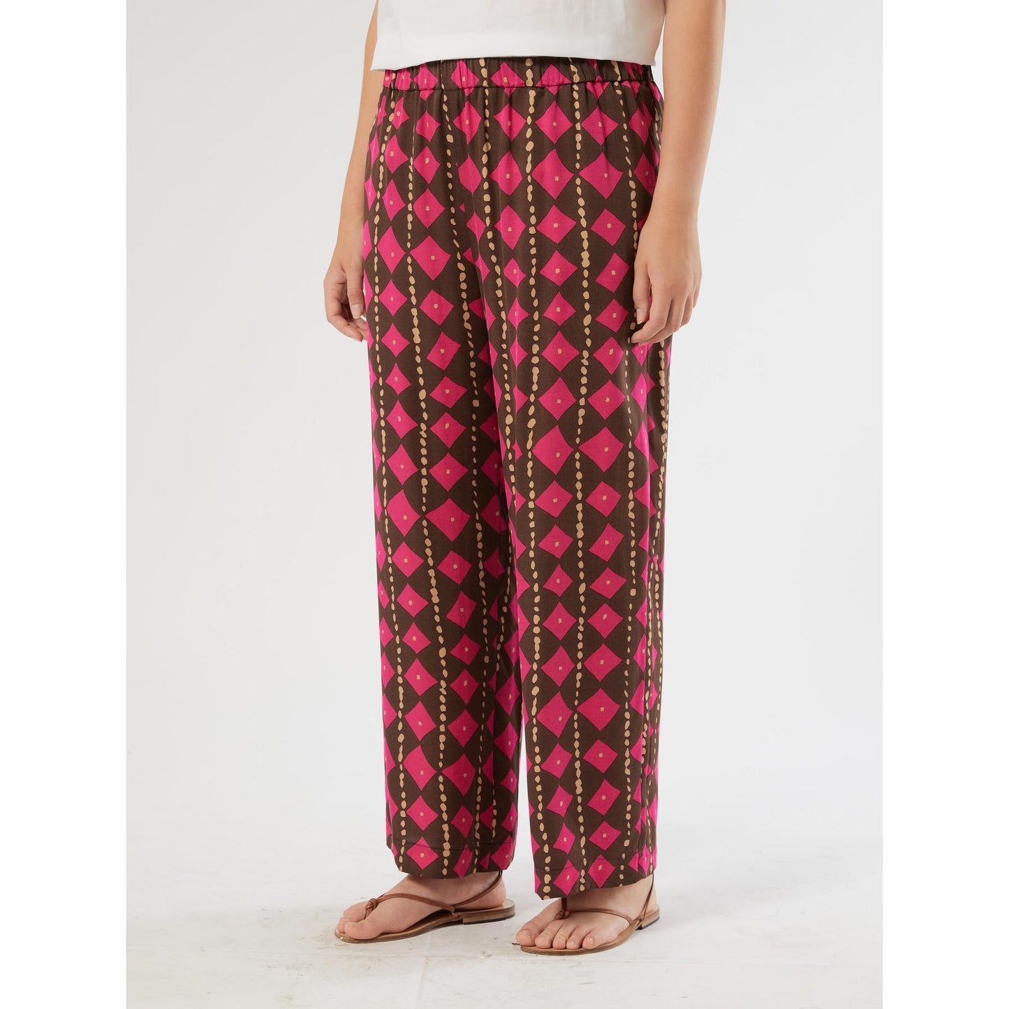 BIKINI printed viscose satin trousers with bold print and fluid cropped silhouette