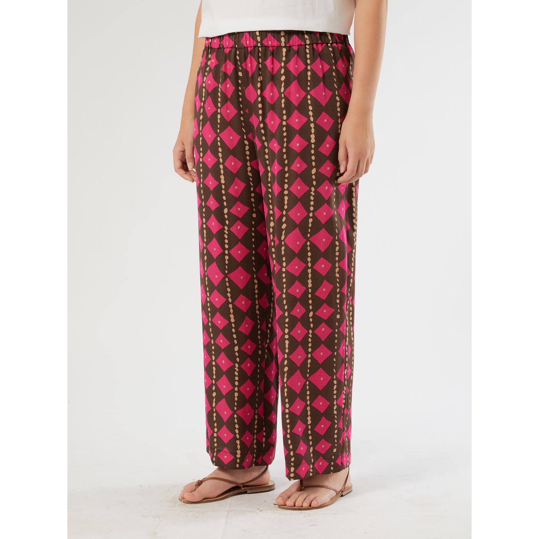 BIKINI printed viscose satin trousers with bold print and fluid cropped silhouette
