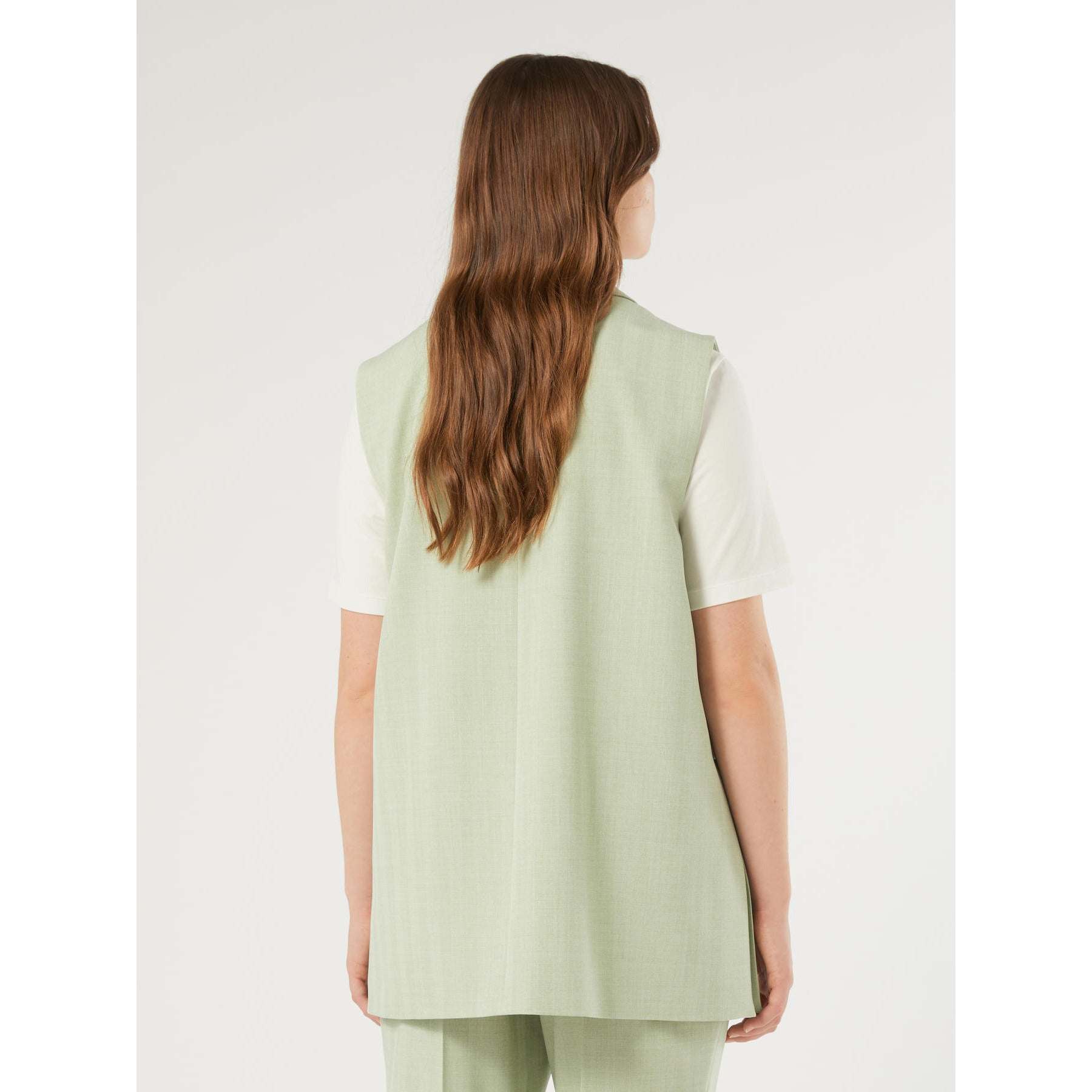 DIALOGO Tailored Gilet in soft sage green with lapel collar and semi-fitted silhouette for modern tailored elegance