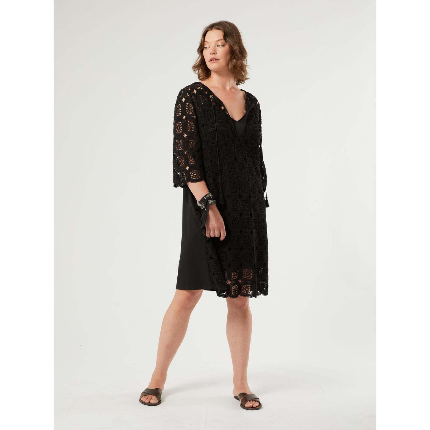 AFELIO crochet dress with V-neckline, torchon ties, tassels, 3/4 sleeves, and breathable cotton crochet fabric.