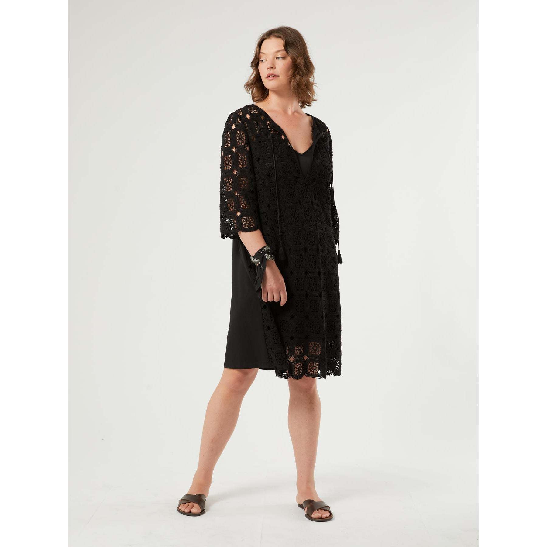 AFELIO crochet dress with V-neckline, torchon ties, tassels, 3/4 sleeves, and breathable cotton crochet fabric.