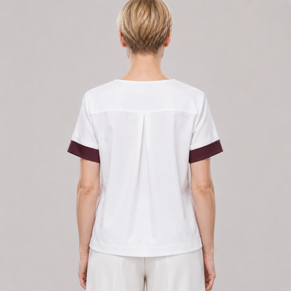 White Linen Short Sleeve Jacket with burgundy sleeve cuffs, a loose straight shape, and a back pleat.
