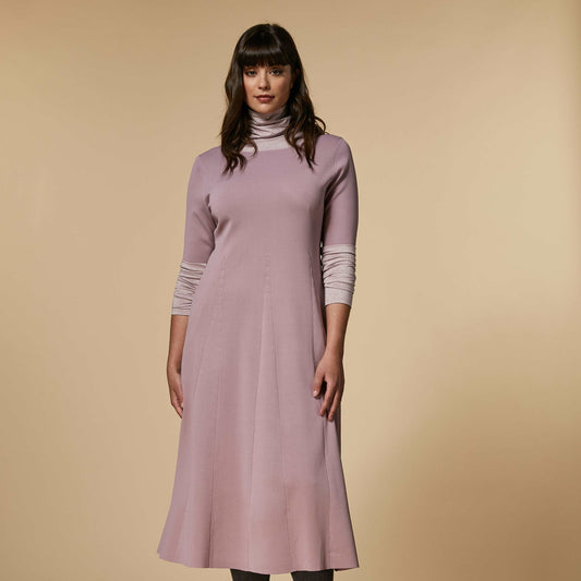 Dress made of stretchy viscose Milano stitch knit, with a segmented intarsia wedge construction to create a striking effect. Wide neckline, long sleeves, and a flared silhouette. Intricate detailing that creates a versatile feminine line.