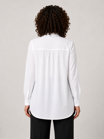 White GAFFI cotton shirt with long sleeves, pointed collar, ruffle polo fastening, and relaxed fit