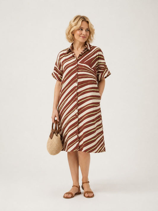 Woman wearing PEDONE printed cotton dress with graphic print and three-quarter sleeves standing outdoors
