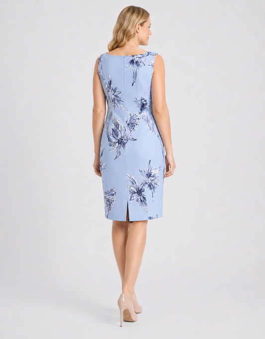 Elegant DECAEDRO dress with crystal embellishments, round neckline, back slit, and hidden zipper