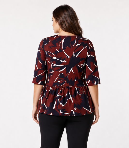 Blouse FAVORIRE with elbow-length sleeves and peplum hem in graphic print, made from stretch polyester for a feminine, structured silhouette.