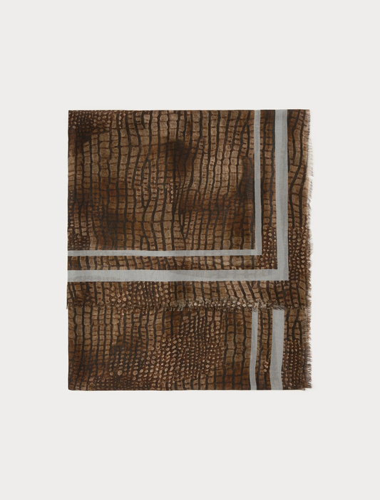 A square scarf with a brown and black reptile-like textured pattern, featuring a white geometric border design, displayed flat against a light gray background.